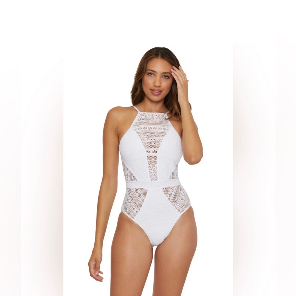 Becca swimsuit one piece, is a large size and is green color. is with tag in